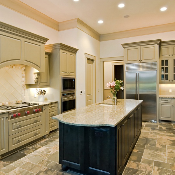 A photo of a beautiful kitchen with porcelain tile flooring. Another option is ceramic flooring which isn't shown here.