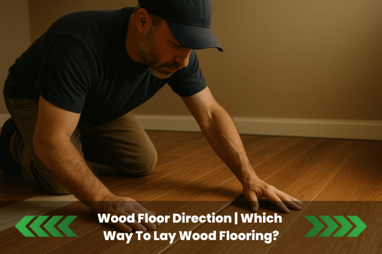 A flooring installer kneels on a warm-toned hardwood floor, carefully aligning planks in a uniform direction. He wears a navy cap, dark shirt, and khaki pants, working under cozy indoor lighting that highlights the wood grain and smooth adhesive surface.