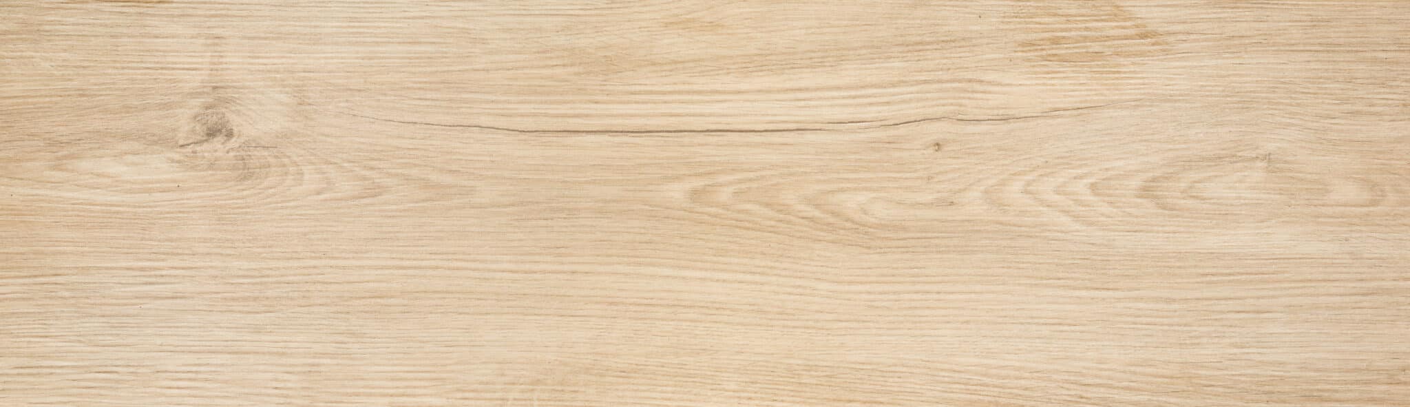 Light oak wood grain texture showing natural knots and fine grain detail